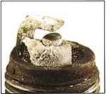 NGK deposits on the plug - mixture too lean.jpg