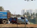 Ape - transfering garbage - India.JPG